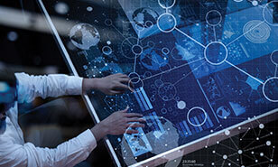 man manipulates a table full of data
