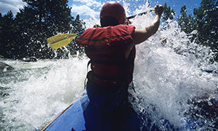 kayaker in rough water