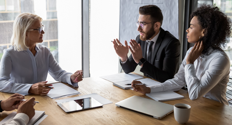 Businesspeople having a conversation