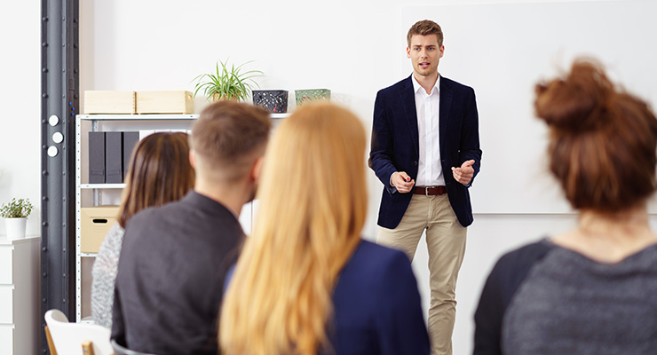 Young professional giving a presentation