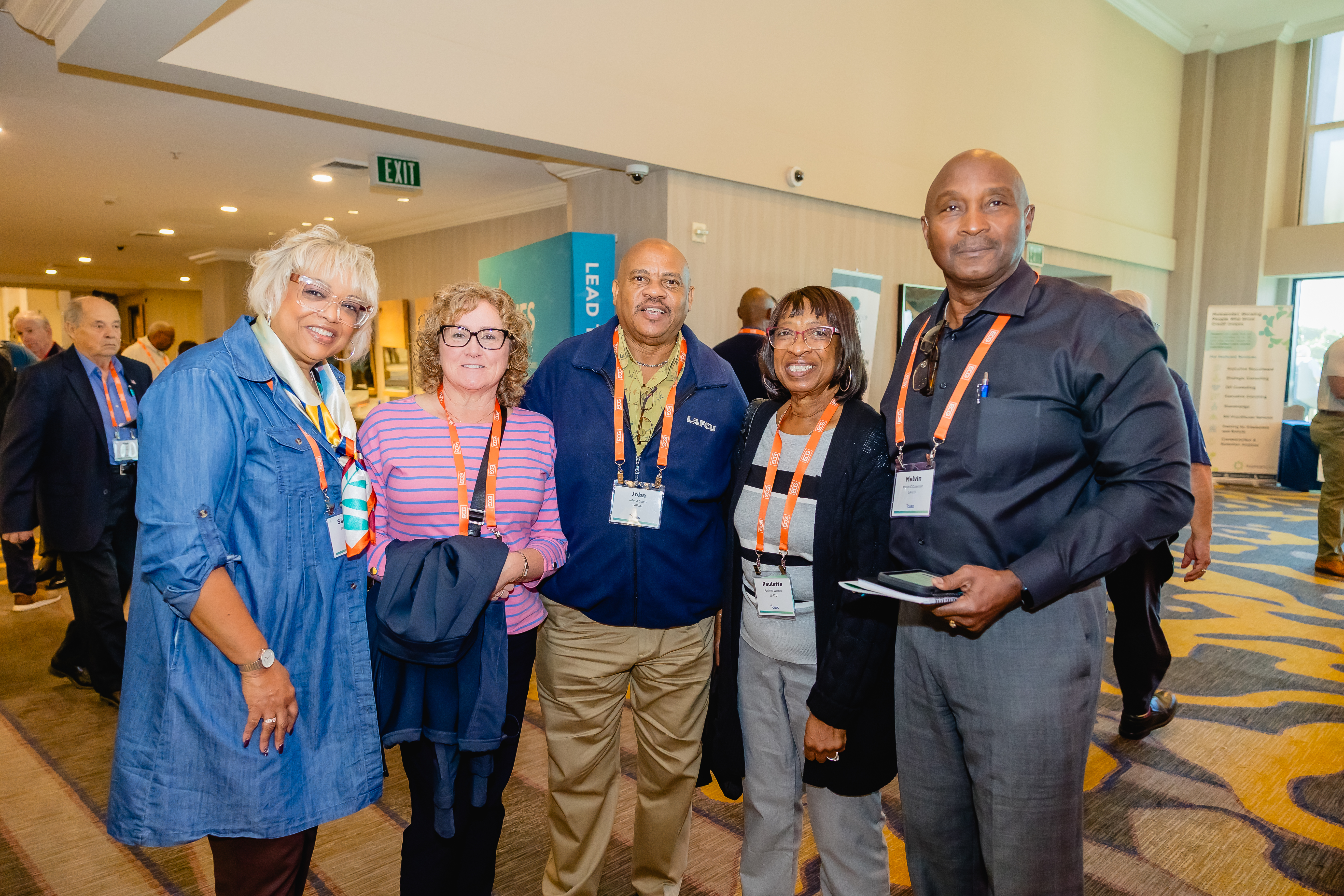 Group of attendees smiling for picture