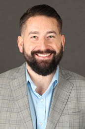 Dustin Daniels headshot