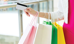 woman pays with credit card
